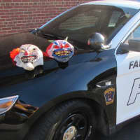 <p>&quot;Creep clown&quot; masks on Fair Lawn police cruiser.</p>