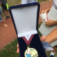 <p>The medal the Raiders received for participating in the Junior League World Series. </p>