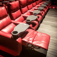 <p>Put your feet up and enjoy your favorite snack and drink during a movie.</p>