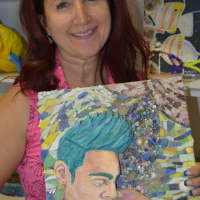 <p>Christine Zaccardi holds a student&#x27;s 3D work.</p>