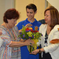 <p>Debra Ferman of Mahwah, recipient of a living kidney location, accepts flowers Friday at Hackensack Meridian Health System.</p>