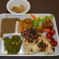 <p>A meal prepared by volunteers for everyone in the temple one Sunday night. The free meal is a weekly tradition.</p>