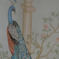 <p>Inside the temple. Murals depict symbols and images revered throughout India, such as peacocks, the national bird.</p>