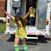 <p>Children in the Chief Michael Feeney Junior Police Academy in Ridgewood tour the bomb squad truck Wednesday at Benjamin Franklin Middle School.</p>