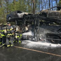 <p>Fire crews respond to a tractor-trailer car carrier fire on Interstate 95.</p>