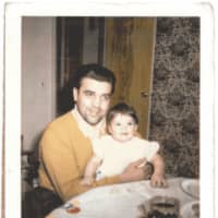<p>Rita Gigante as a toddler sitting on her father&#x27;s lap. She said he had a warm, sweet side and used to rub her back when she was feeling ill or anxious.</p>
