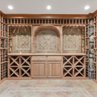 <p>An impressive wine cellar is just below the home&#x27;s game room.</p>
