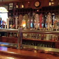 <p>The Huddle boasts 21 drafts of beer.</p>