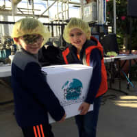 <p>Youngsters help package food at last year&#x27;s Hunger Project at Mahwah&#x27;s Secor Farms.</p>
