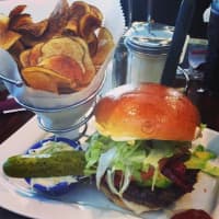 <p>Tom Sawyer&#x27;s is known for its burgers.</p>