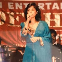<p>Kapur performs on a tour across the United States in 1995.</p>