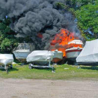 <p>Firefighters were able to contain a fire involving two boats at an area marina.</p>