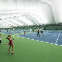 <p>Recycled tennis balls are used for the courts at Tenafly Racquet Club.</p>