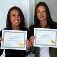<p>Allyson Greifenberger (left) and Kristy Gordon (right) with their certifications.</p>