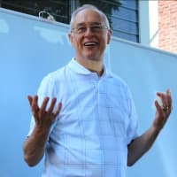 <p>Fair Lawn Pastor Marc McGrath addresses his congregation at a barbecue this summer.</p>