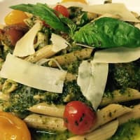 <p>Whole wheat pasta with kale pesto and roasted cherry tomatoes at Luigi&#x27;s in Fairfield.</p>