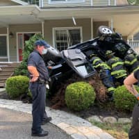 <p>A driver lost control, rolled over a vehicle, and crashed into a Montebello home.</p>