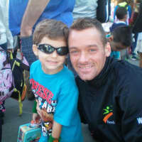 <p>Aidan Walsh, owner of Ridgewood&#x27;s Racefaster, LLC, and his 7-year-old son.</p>