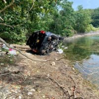 <p>A car was totaled after crashing near a Northern Westchester reservoir.</p>