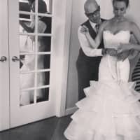 <p>Wedding dress designer Angel Rivera with a client.</p>