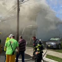 <p>Town Council President Randy Piazza Jr. spotted smoke billowing from 63 Heckman St. while driving to an appointment shortly before 12 p.m.</p>