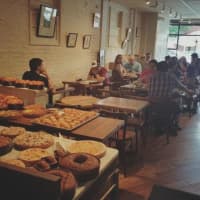 <p>Patisserie Florentine in Englewood has an inviting, cheery decor.</p>