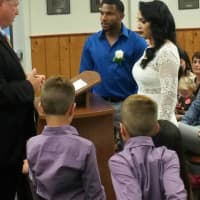 <p>Emerson Mayor Lou Lamatina officiates the wedding of New York Mets former baseball great Endy Chavez to his wife Patrice.</p>