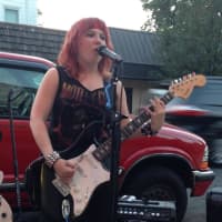 <p>Mary O&#x27;Neill, of River Vale, performs outside of Rony&#x27;s Rockin&#x27; Grill, in Bergenfield, with Lunatic Fringe.</p>