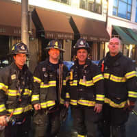 <p>Greenwich Firefighter Tom Pitasi with his fellow firefighters after fighting his last fire before retiring.</p>