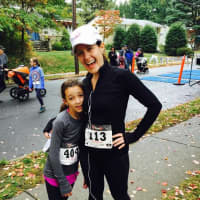 <p>Goldberg-Schwartz and daughter Sophie following a local 5K.</p>