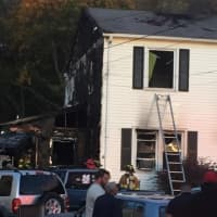 <p>The three-alarm blaze in the 2½-story house on Halstead Place also drew firefighters from Garfield and Saddle Brook.</p>