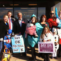 <p>Tracy Rozansky, far left, and Ashlee Nauta, center, raise awareness with other Wayne families and officials for Full-Day Kindergarten.</p>