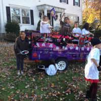 <p>Young River Vale artists paint the Buzelli&#x27;s trailer for Halloween festivities.</p>