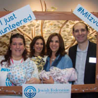 <p>Rabbi Noah Fabricant, far right, and members of Temple Beth Or unite for Mitzvah Day.</p>