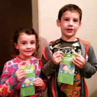<p>Katz&#x27; patients collect their Toys R Us gift card after donating candy to the Candy Buy Back program.</p>