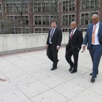 <p>New Rochelle Superintendent of Schools Brian Osborne, New York State Assembly Speaker Carl Heastie and High School Principal Reggie Richardson touring the school grounds.</p>
