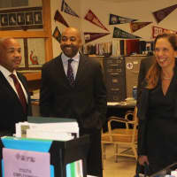 <p>Assembly members Carl Heastie and Amy Paulin with New Rochelle City Councilman Jared Rice in the high school.</p>