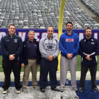 <p>Coach Howell (far right) with his coaching staff at Metlife Stadium.</p>