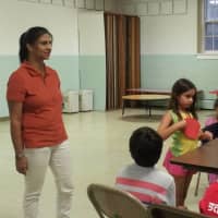 <p>Sudeshna Chakravorty teaches youngsters how to play ping pong and will offer sessions in January in Cresskill.</p>