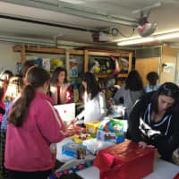 <p>Northvale Girl Scouts wrapped gifts for needy families for the holidays. </p>