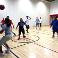 <p>A new lunchtime tradition of friendly competition on the basketball court has emerged at Peekskill High School Summit Academy.</p>
