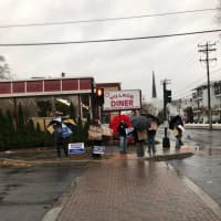<p>A group of counter-protestors outside Saugerties&#x27; Village Diner</p>