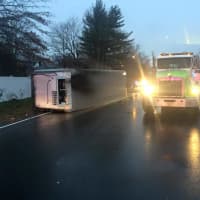 <p>An overturned tractor-trailer tied up traffic on Route 17 Tuesday morning.</p>