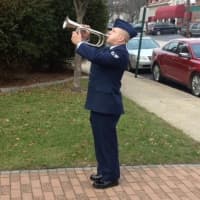 <p>Nick Magerelli Sr. plays during the Wreaths Across America ceremony.</p>