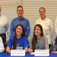 <p>Northern Valley Regional High School students Veronica and Victoria Corcoran sign their letters of intent to the University of New Orleans. </p>