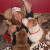 <p>Janine Weinert of Norwood helps people and animals.</p>