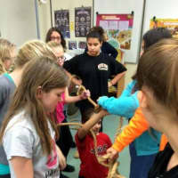 <p>Wayne students participate in a group activity with a rope.</p>