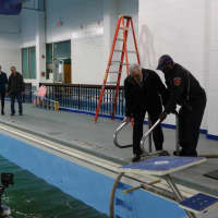 <p>Members of the New Rochelle Chamber of Commerce helping get the pool at the YMCA ready.</p>