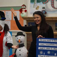 <p>Pre-kindergarten and kindergarten students enjoyed hearing the book &quot;Snowmen at Night&quot; read aloud while watching adults act out the story.</p>