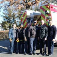 <p>Members of the New Rochelle Fire Department were on hand at the YMCA to lend a hand and fill the pool after nearly a year of renovations.</p>
